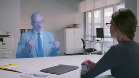 Hr manager have online meeting with job candidate holograph. Businesspeople Connect to Augmented Reality cyberspace Metaverse.  - Powered by Shutterstock - Get 15% off with code: PIKWIZARD15