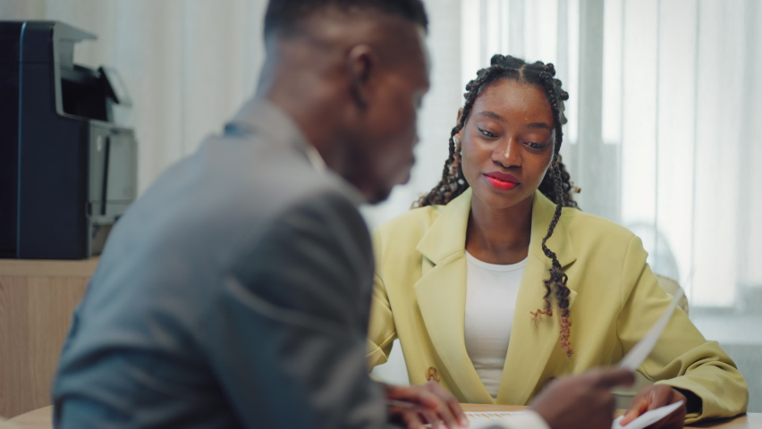 job interview and consultation with lawyer, african american man and woman are discussing in office Royalty-Free Stock Footage #1094112377