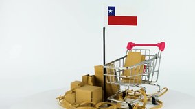 Chile flag with supermarket handcart and cardboard boxes video, 4K 60 fps, online marketing and shopping concept, foreign trade idea, selling product in Chile, turning platform, e-commerce video
