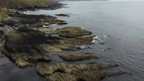 Huge rocks on the seashore. Rocky seashore, aerial view.