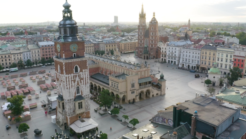 Cinematic Aerial Shot of Old Town Square in Krakow, Poland at Sunrise Royalty-Free Stock Footage #1094130833