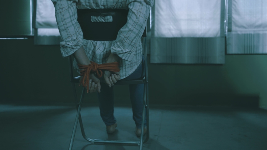 Woman Tied to Chair.