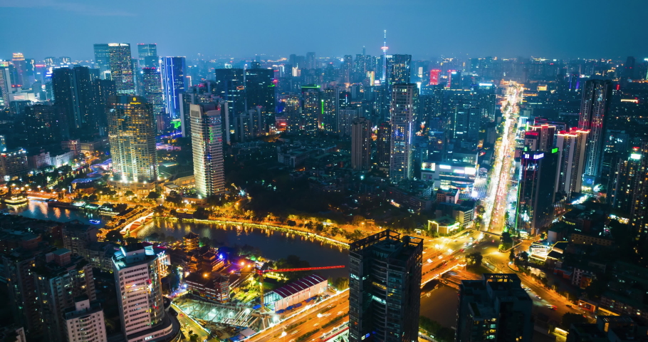 Aerial hyper lapse (hyperlapse - time lapse) of Chengdu Cityscape traffic on the road at twilight of Sichuan China