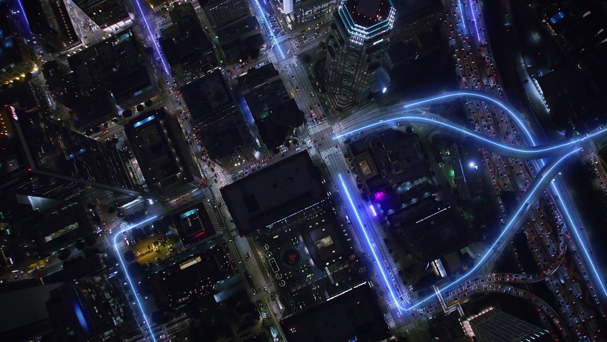 
Overhead Close up Aerial View of Smart City With  Connected Speed Neon Line Lights. Line Trail Flashing In Streets And Avenues. Downtown Los Angeles. Royalty-Free Stock Footage #1094162333