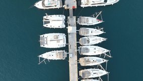Yacht Marina. Top view aerial footage of many luxury boats and yachts in the harbor. Drone shooting, aerial view. Mediterranean, TURKEY
