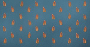 Animation of rows of autumn orange leaves on blue background. autumn, fall, season, nature, pattern and colour concept digitally generated video.