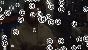 Animation of euro symbols over smiling biracial male worker in warehouse. Global business, shipping and digital interface concept digitally generated video. - Powered by Shutterstock - Get 15% off with code: PIKWIZARD15