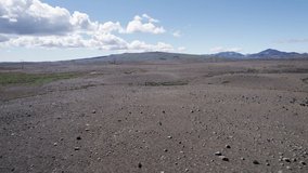 Aerial view flying on barren gravel wilderness in remote uninhabited area at highlands of Iceland - Powered by Shutterstock - Get 15% off with code: PIKWIZARD15