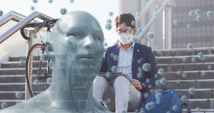 Animation of covid 19 virus cells and digital human head over asian businessman wearing face mask. Covid 19 pandemic and digital interface concept digitally generated video.