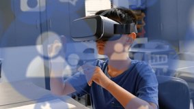 Animation of blue network connection and data sharing icons with a boy using a VR headset in a school classroom in the background - Powered by Shutterstock - Get 15% off with code: PIKWIZARD15