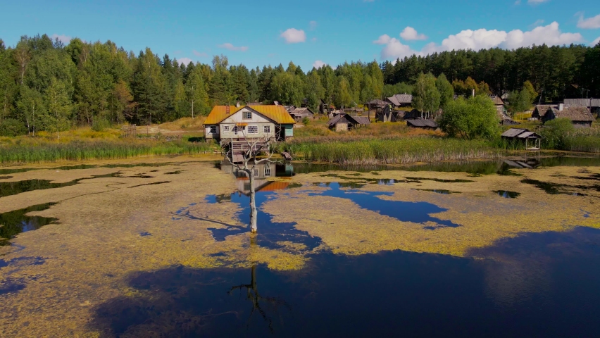 Authentic abandoned Belarusian village with houses built in the early 20th century. Located near the lake and the forest, away from civilization.
