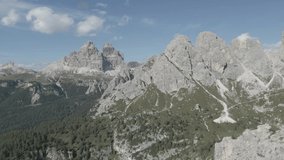 Mountain Crest Aerial Drone with Clouds Video. 4K Mountain Peak Aerial Footage in the Dolomites Italy in D-Cinelike LOG format