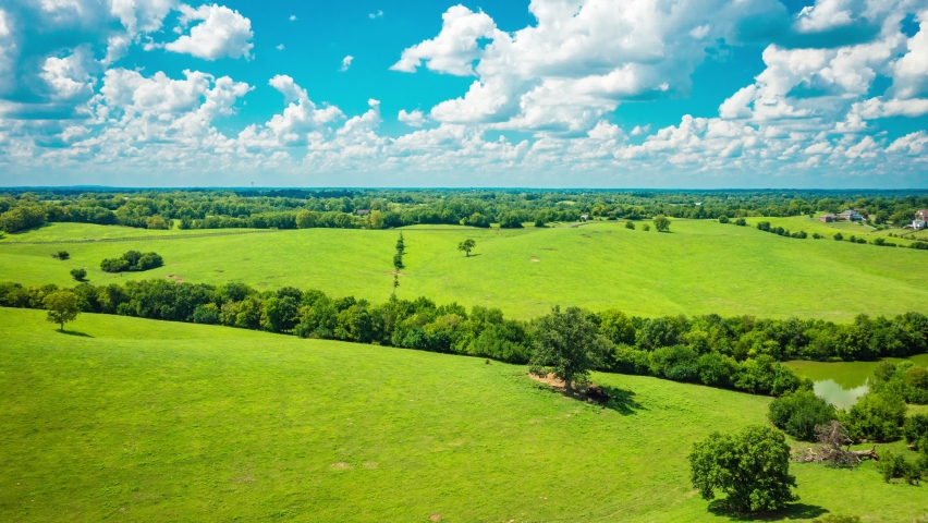 Aerial hyperlapse of Central Kentucky countryside on a bright sunny day