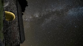vertical video timelapse of romanesque hermitage of Sant Quirc under star trails