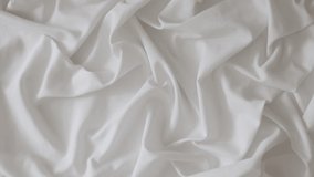 White fabric. Drapery wavy texture white linen cloth background on morning sunshine. Clean clothes concept. - Powered by Shutterstock - Get 15% off with code: PIKWIZARD15