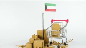 Kuwait flag with supermarket handcart and cardboard boxes video, 4K 60 fps, online marketing and shopping concept, foreign trade idea, selling product in Kuwait, turning platform, e-commerce video