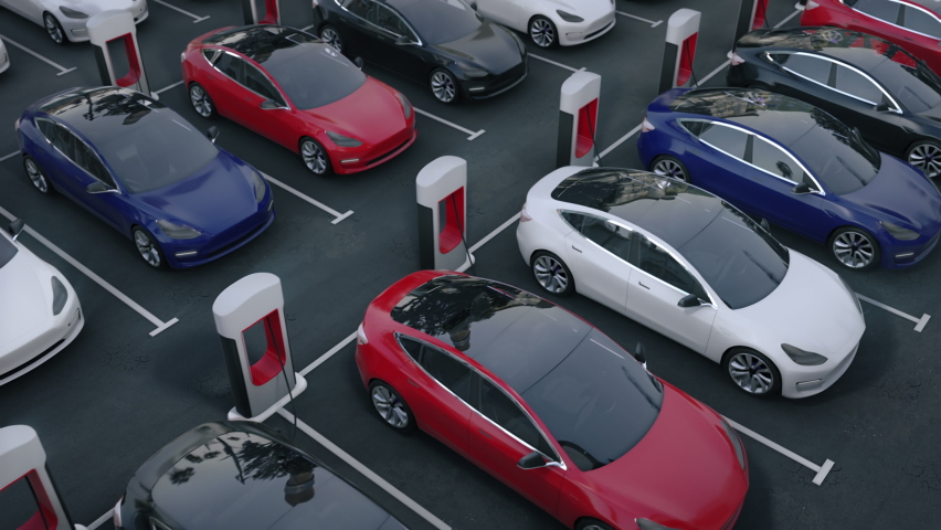 Aerial View Of New Modern Generic Electric Self Driving Cars on Huge Car Dealership.  Parking Lot With Electric Charging Stations For Driverless Electric Vehicles. IOT. EV. Royalty-Free Stock Footage #1094270259