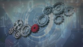 Animation of network of cogs spinning over binary coding. Global technology, connections, data processing and business concept digitally generated video. - Powered by Shutterstock - Get 15% off with code: PIKWIZARD15