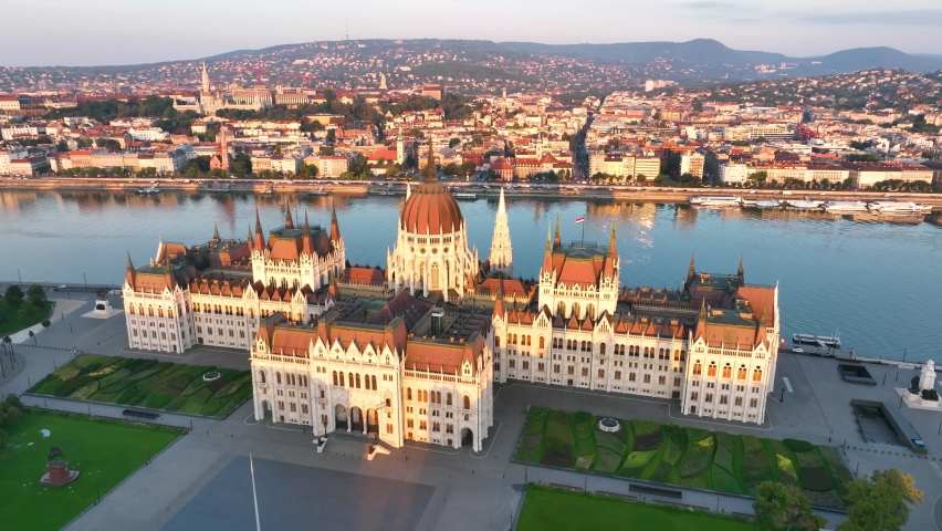 Hungarian Parliament Building with the Danube river, in Budapest, Hungary. 4K aerial drone view