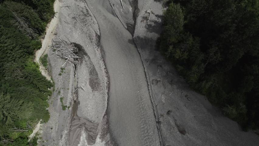 Aerial view of vista of evergreens and glacial fed nisqually river in Washington state. South of Mount Rainier National Park