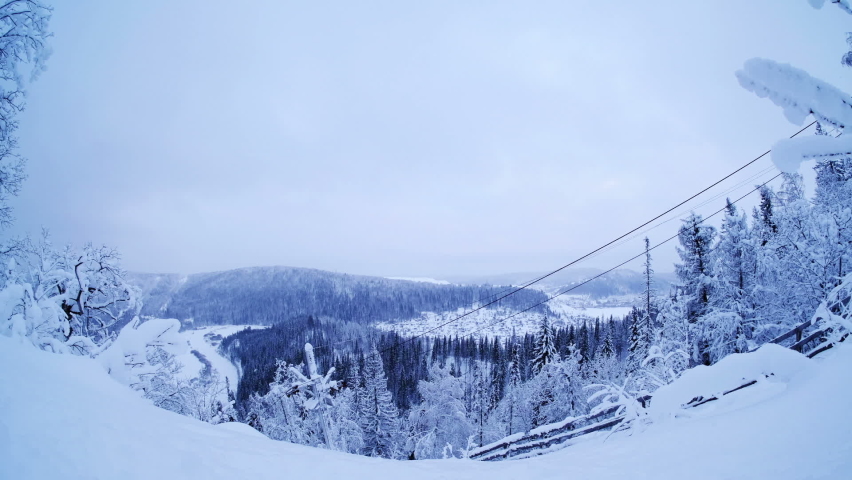 Timelapse footage ski lift mooving in mountains