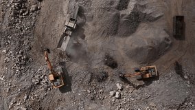 Concrete Recycling and asphalt from demolition. Excavator at landfill the load concrete waste in a mobile jaw crusher machine. Disposal of construction waste. Re-use concrete after demolition. - Powered by Shutterstock - Get 15% off with code: PIKWIZARD15