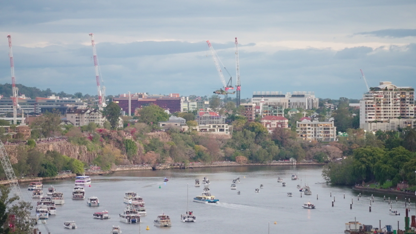 Brisbane River With Boats And Military Helicopter Hovering Over Water In CBD During Riverfire Festival, 4K Slow Motion