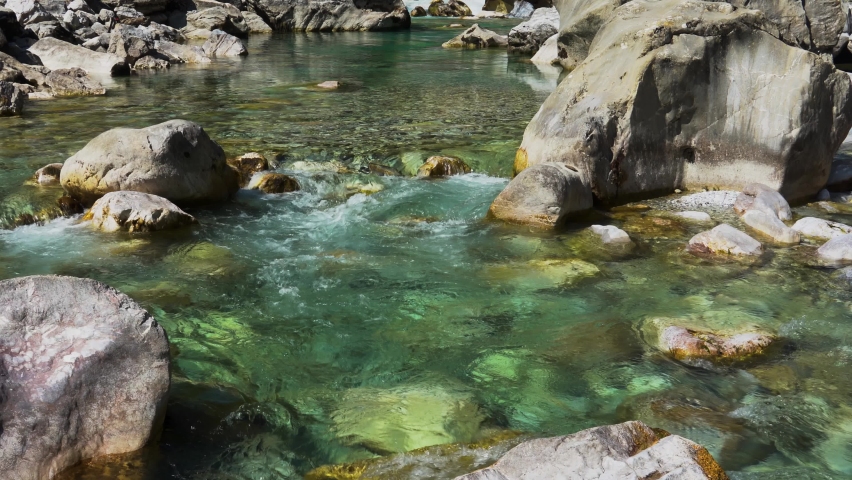 Turquoise water pond of mountain river wallpaper, clear water streaming across cliffs