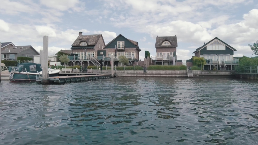 villa district at waterside with personal jetty