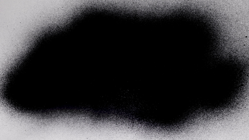 Black spray paint on a white background. Overlay.