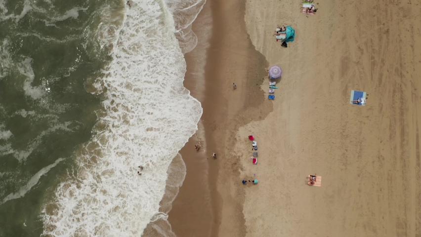 Aerial view of people on the beach at Virginia Beach, Virginia, United States.