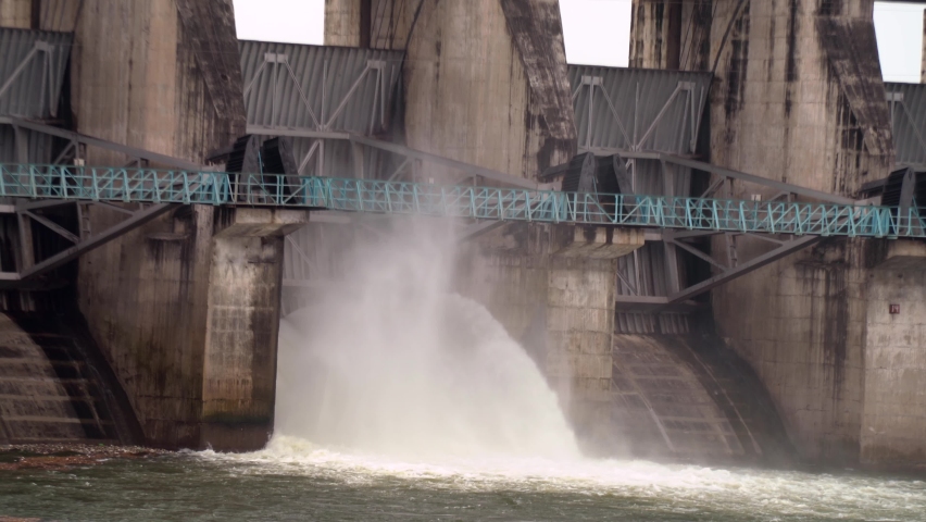 Bisalpur dam, Kota, Rajasthan, India. Hydroelectric dam on the river, water discharge from the reservoir. Water flowing down water reservoir lake dam sustainability renewable green hydro power