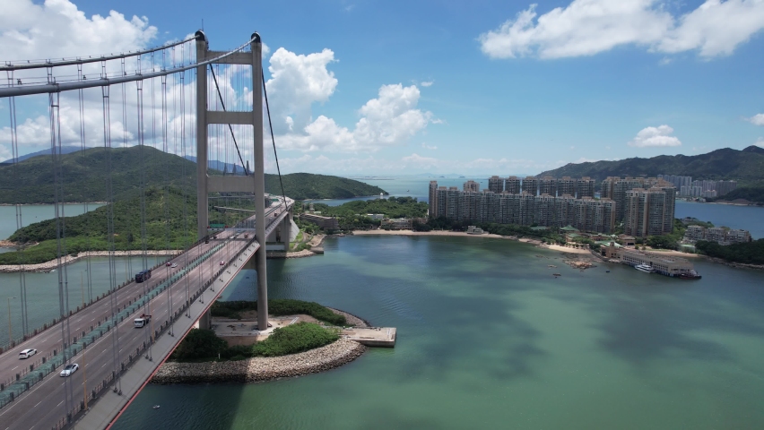 Aerial Highway Flyover Traffic on Ma Wan in Hong Kong Tsing Ma suspension Bridge, Ting Kau bridge Royalty-Free Stock Footage #1094402191