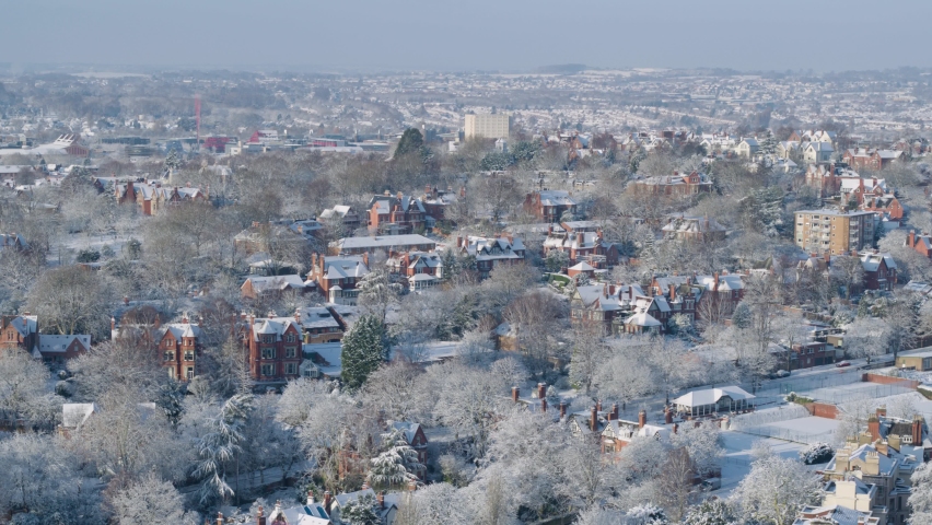 Aerial cinematic drone shot of beautiful red brick houses in nottingham during the winter months