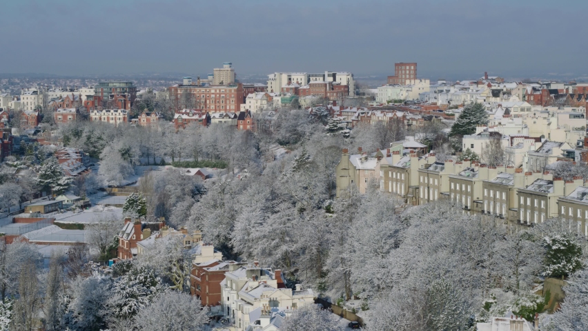 Aerial cinematic drone shot of houses in Nottingham UK during the winter months