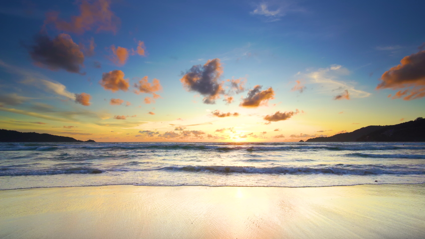 Sunset or sunrise. Sun over sea. Sun clouds. Nature environment background. Panorama sundown over ocean. Dramatic colorful sky. Sunset beach background. Beginning.