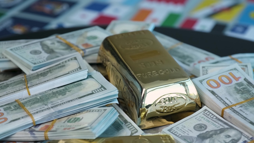 Lots of Gold and Dollars on World Flags Royalty-Free Stock Footage #1094408987