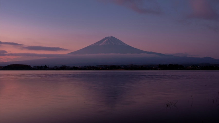 Time lapse of beautiful sunrise over mount fuji reflection on Kawaguchiko Lake in the morning at Yamanashi, Japan