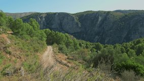 Gravel bike riding in nature,  gravel road biking, Costa Blanca mountains,Alicante, Spain - stock video