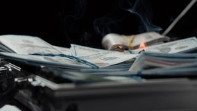 Burning American hundred dollar banknotes, Flame of fire from money. Rich person having stacks of 100 US dollars in metallic suitcase. Paper money loss, financial crisis and depressed economy.  - Powered by Shutterstock - Get 15% off with code: PIKWIZARD15
