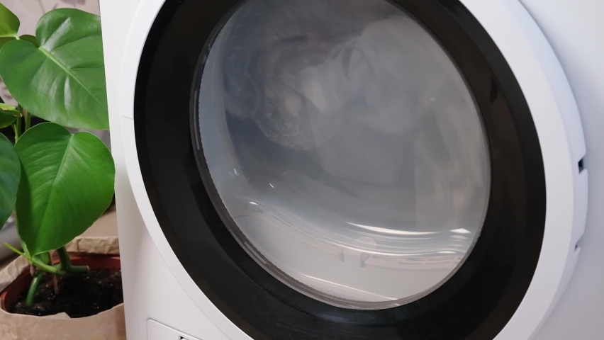 Drying machine in the house for drying linen, clothes, bed linen. Dryer. Royalty-Free Stock Footage #1094435763