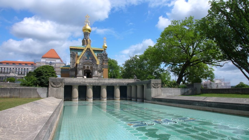 Mathildenhoehe russian orthodox chapel Darmstadt with Hochzeitsturm wedding tower and fountain art nouveau steady wide angle gimbal shot 4k on a sunny day blue sky