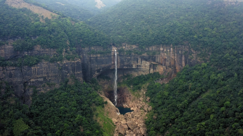 Tallest Plunge Waterfall In Sheer Mountains - NohKaLikai Falls In Meghalaya, Near Cherrapunji, India. Aerial Drone Shot Royalty-Free Stock Footage #1094440129