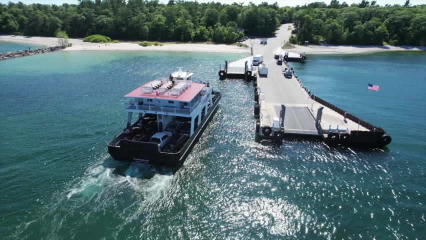 The Washington Island Car Ferry approaches the pier at Northport, Wisconsin located on the far north shore of the Door County Peninsula located between Lake Michigan and the bay of Green Bay.