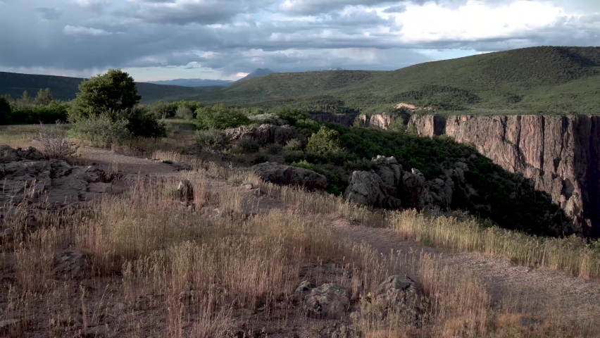 Stone marker at Black Canyon of the Gunnison National Park west Rocky Mountains in Colorado, Aerial dolly in shot