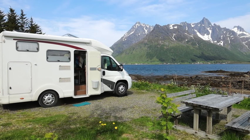 Family vacation travel RV, holiday trip in motorhome, Caravan car Vacation. Beautiful Nature Norway natural landscape.
