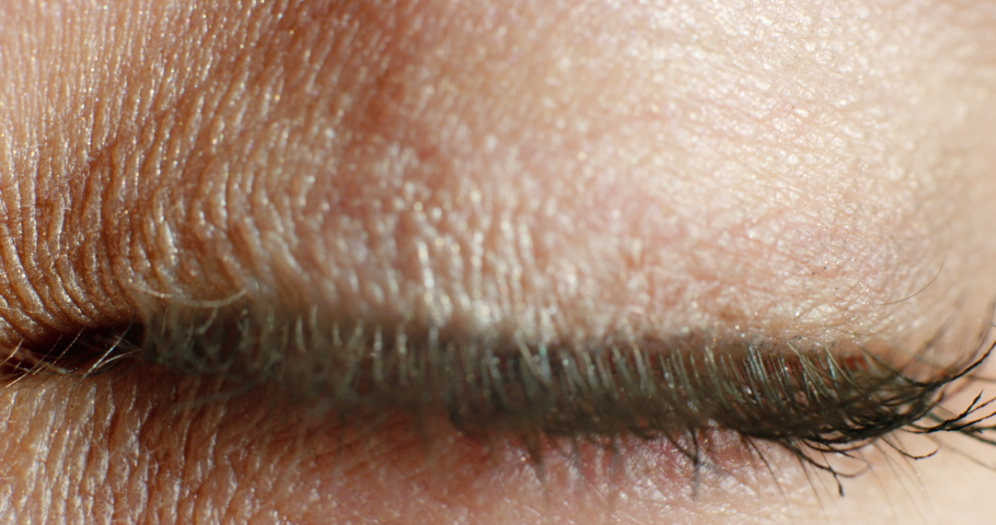 Woman face, blue eyes and vision focus, eyeball and contact lenses to see, eyesight and awareness. Closeup portrait face macro cosmetics lashes, optometry test and awake perception of human anatomy