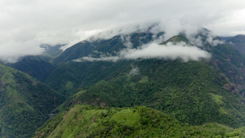 Clouds Over The Mountain Peak Of Khasi Hills In Meghalaya, India. - aerial Royalty-Free Stock Footage #1094470897
