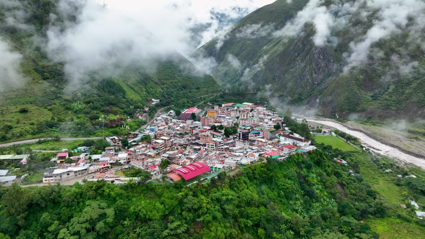 Aerial drone fly view of Santa Teresa town city village green rainforest valley andes mountains Hidroelectrica Aguas Calientes Machu Picchu Peru South America Royalty-Free Stock Footage #1094471869
