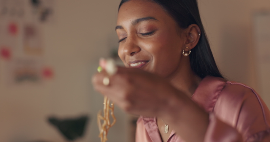 Happy, eating and chinese food delivery of a woman from India doing a happiness dance with chopsticks. Hungry Indian person with take out noodles with a smile dancing with gratitude at a house | Shutterstock HD Video #1094476197
